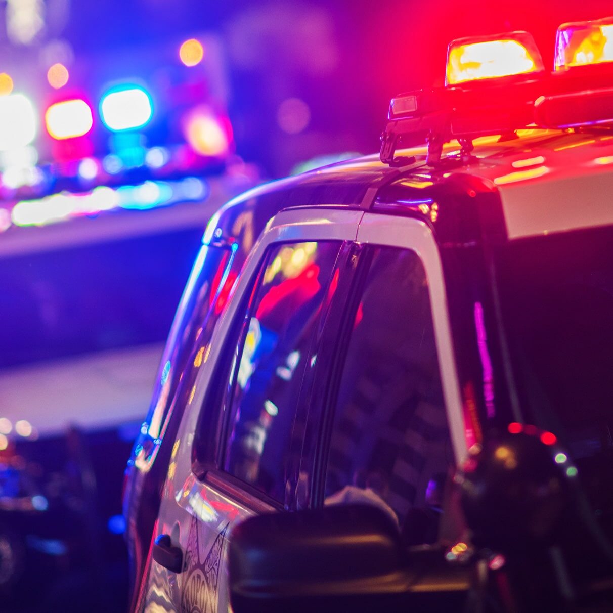 Flashing police lights at night